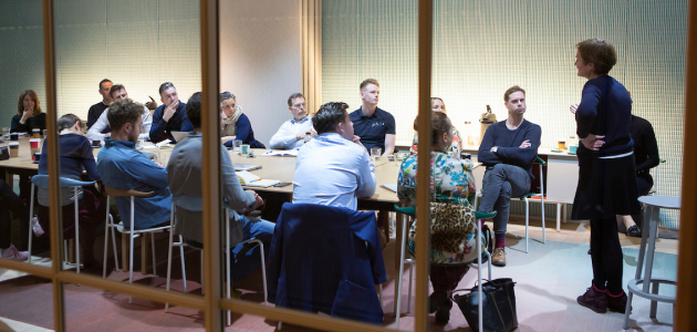 A team meeting in a large office